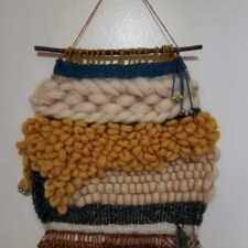 FRAN ENGLANDER
I started this as part of my first free-form weaving class in February or March. Had to gather additional yarns etc. to finish at home, and then teach myself how to remove it from the loom.
