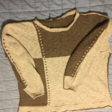 DEBBY LEVINE
The sweater is made from an old Pingouin yarn (I used it back in the 1980s) that I purchased last year from Alyce MacDonald. I intend it to be worn as a sweatshirt when it ever gets cooler. The garment I made in the 80s has long since been given away as, no surprise, it stopped fitting me a long time ago.
The cap is made from a very soft and luxurious bison blend yarn that I totally splurged on at Stitches, a knitting expo, several years ago. I made it two layers as the yarn is very thin and I wanted to use it up on something just for me. There is enough left to use as a color pattern on another cap or some mittens. We’ll see.