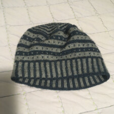 DEBBY LEVINE
The cap is made from a very soft and luxurious bison blend yarn that I totally splurged on at Stitches, a knitting expo, several years ago. I made it two layers as the yarn is very thin and I wanted to use it up on something just for me. There is enough left to use as a color pattern on another cap or some mittens. We’ll see.